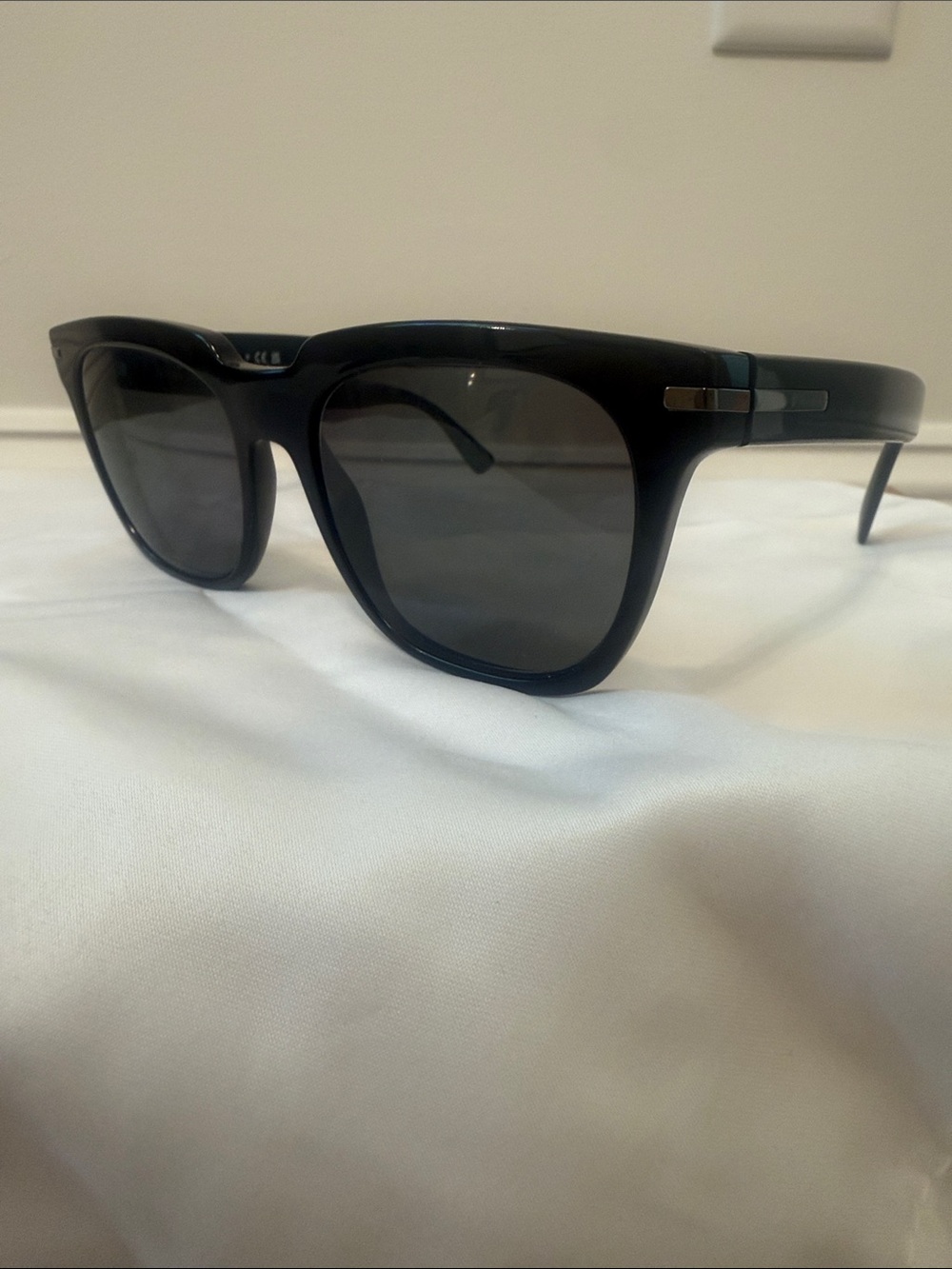 Prada Black Frame Sunglasses with Dark Gray Lenses